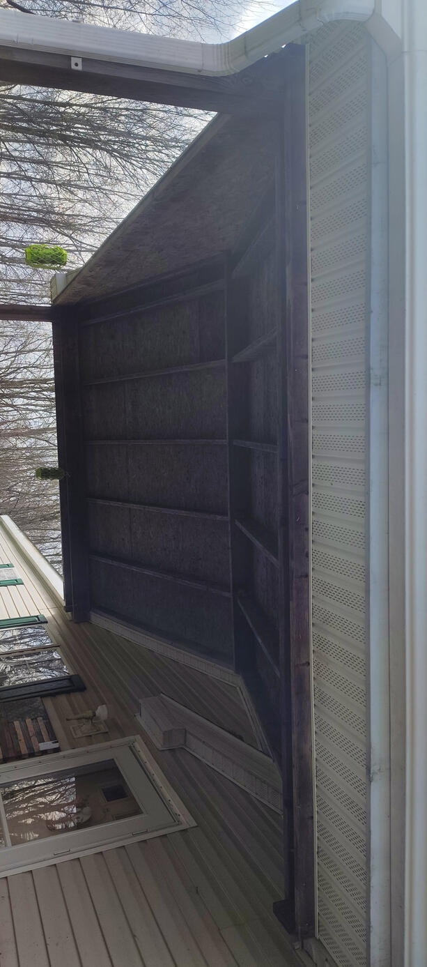 Before we installed a Vinyl Soffit and ran electric for lights and exterior tv